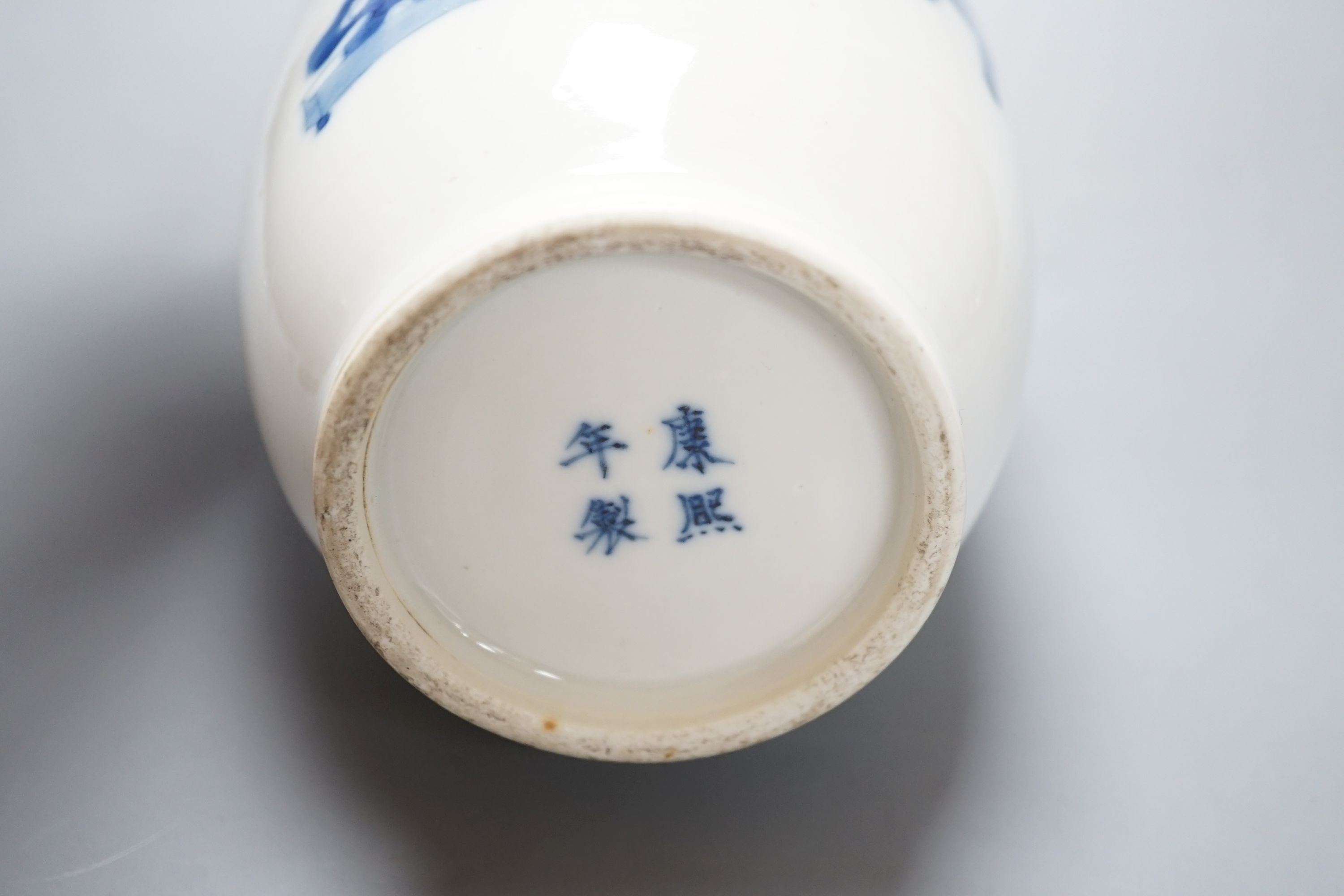 A Chinese blue and white ‘sages’ vase, 27 cms high.